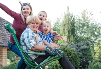 Obraz premium Family portrait.Visiting grandmother.