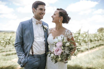 bride and groom laughing