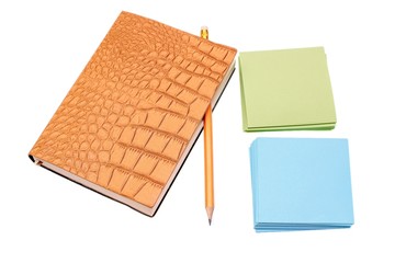 Notebook with leather cover and colored paper for writing, isolated on white background