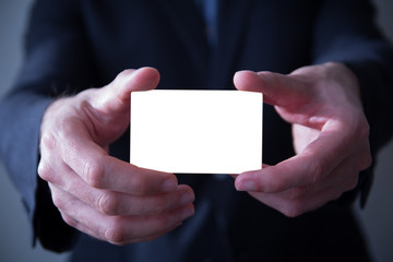 businessman holding business card