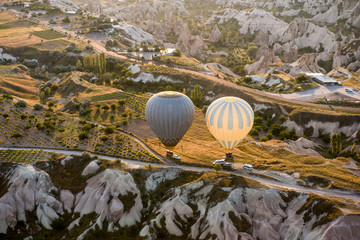 Fototapeta na wymiar Pair of colorful balloons in Cappadocia, Turkey