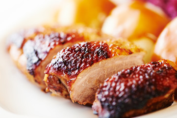Duck breast with potato dumplings and red cabbage