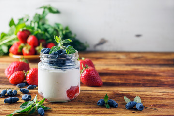 Useful berries to prepare detox, the story is on a wooden table