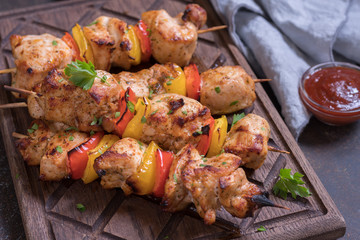 Grilled pork kebab with red and yellow pepper