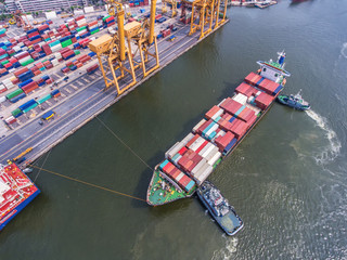 container,container ship in import export and business logistic.By crane ,Trade Port , Shipping.cargo to harbor.Aerial view.Water transport.International.Shell Marine.transportation.business,logistic.
