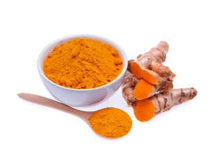 Turmeric roots and turmeric powder on white background