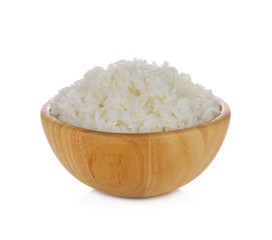 Rice in a wooden bowl on white background