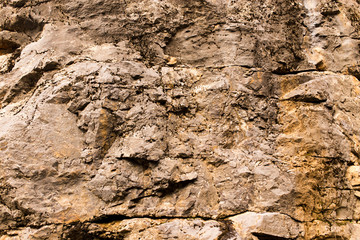 Stone cliffs in the mountains as a background