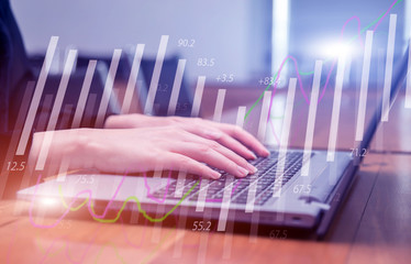 Double exposure stock financial on hand of businesswoman typing on laptop keyboard. Financial stock market economy analysis. Business people and Economy financial concept.
