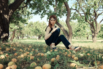 Woman in apricot garden 