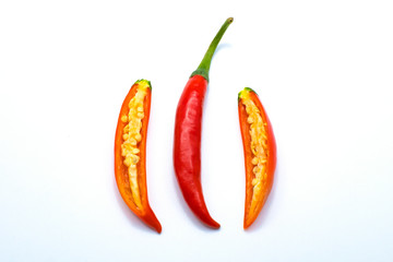 Close up sliced red chilli pepper white isolated