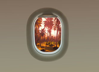 The palms trees on the island of La Digue in the plane window. Tropical Seychelles