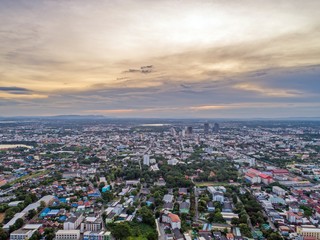 Fototapeta na wymiar Top view from drone camera : Sunset time on city scape, Beautiful city at twilight sky clouds, Khonkaen Thailand.