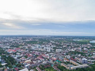 Fototapeta na wymiar Top view from drone camera : Sunset time on city scape, Beautiful city at twilight sky clouds, Khonkaen Thailand.