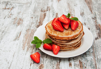 Pancakes with fresh strawberries