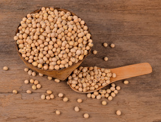 Soybeans on old wood background