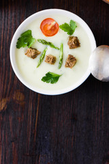 Top view of asparagus cream soup.