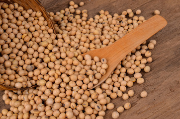 Soybeans on old wood background