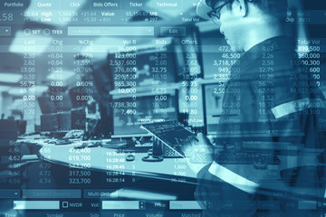 Obraz premium Double exposure of business man with glasses in hipster shirts holding tablet for check stock market graph with stock and computer graph background, Business Trading concept