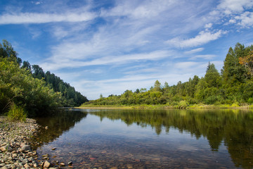 River landscape on a background of a decline in autumn