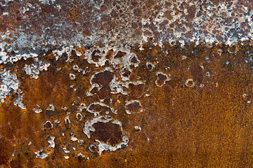 The rust on the surface of the iron.