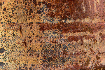 The rust on the surface of the iron.