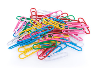 Colored paper clips on white background