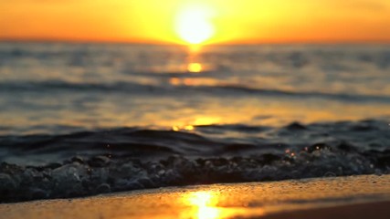 Sand And Waves On Sunset Beach