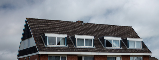  the roof of the house with nice window