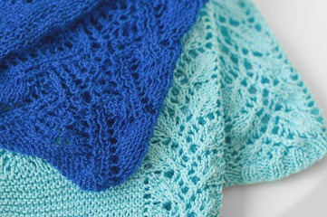 Knitted fabric of dark blue and light blue color. Knitwear