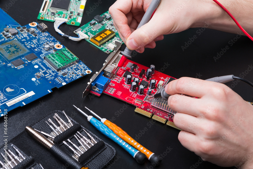Poster electronic circuit red board inspecting close up