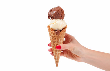 Chocolate and vanilla ice cream cone on white background.
