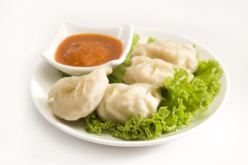Traditional Dumpling Momos Served With Tomato Sauce