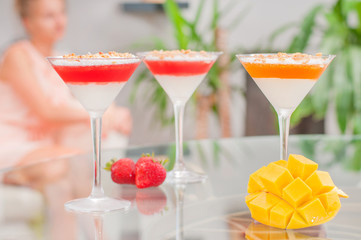 Panna cotta dessert with fruit jelly.