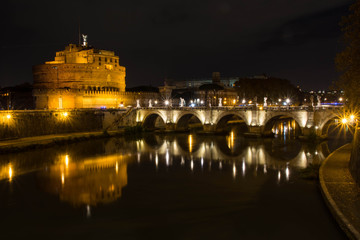 Fototapeta na wymiar Castel sant'angelo with bridge shot at night 