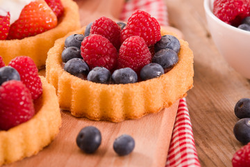 Tartlets with forest fruits. 