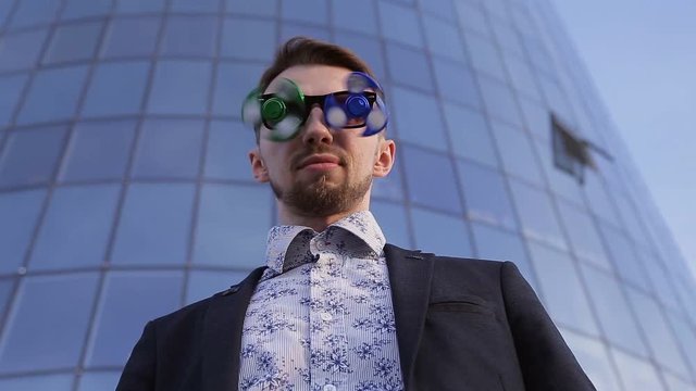 younge man with the spinner glasses