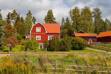 Typical scandinavian wooden houses in village. Dalarna county, Sweden.