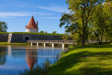 Fototapeta premium Kuressaare Castle and its tower. Summer sunny day. Saaremaa island, Estonia