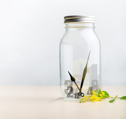 Clock hands in a bottle with numbers, Saveor keep time in a bottle concept