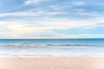 Fototapeta na wymiar sand beach with cloudy
