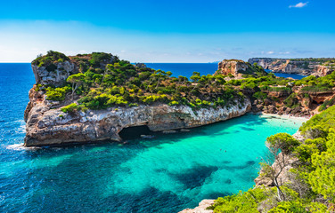Picturesque seascape on Majorca island, view of the idyllic bay beach Cala Moro, Spain Mediterranean Sea - obrazy, fototapety, plakaty