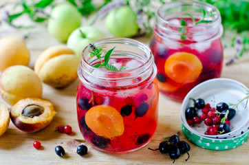 Sangria from apricots, apples and berries