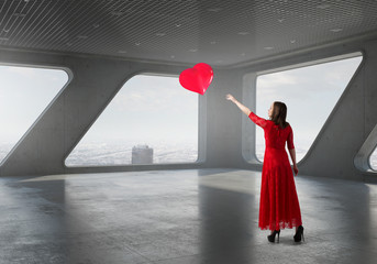 Naklejka na ściany i meble Woman in passionate red dress