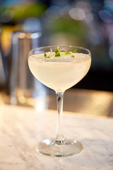 glass of cocktail at bar