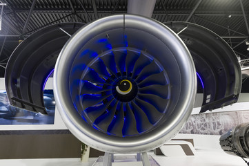 Jet engine with opened hood, turbine blades of modern passenger plane, aircraft concept, aviation and aerospace industry - 164082525