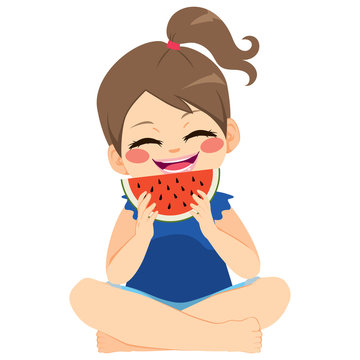 Happy young little girl enjoying eating delicious watermelon holiday summer concept