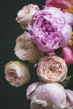 Fototapeta Peonies and bombastic roses bouquet. Shabby chic pastel colored wedding bouquet. Closeup view, selective focus