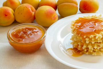 Homemade cookies with apricot jam on a plate