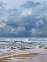 seascape image of stormy day on beach